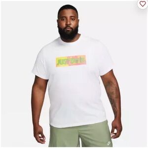Nike Men's White Tee with Colorful Logo